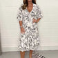 🌸✨👗Elegant V-ringad klänning med botaniskt tryck för kvinnor