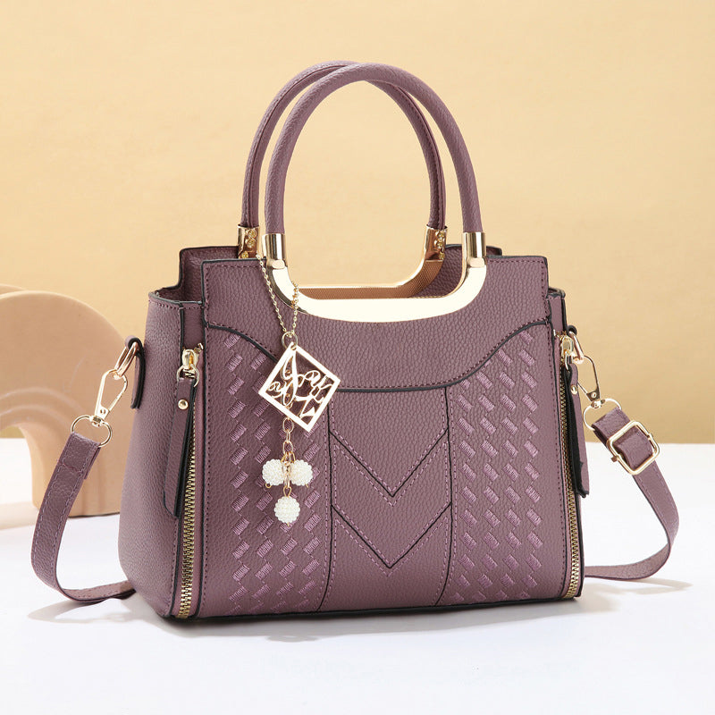 🔥 50% RABATT 👜 Elegant damväska med topphandtag ✨ V-sömnad, gulddetaljer & smart förvaring – stilren för både vardag och fest 💼