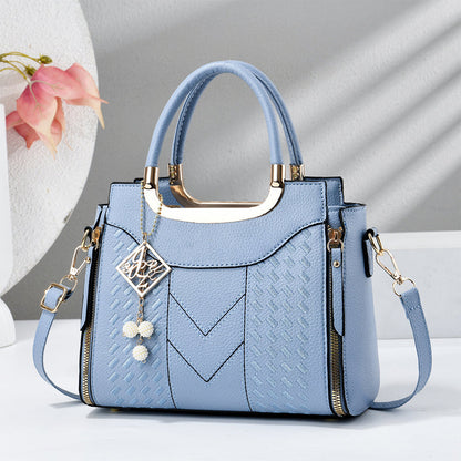 🔥 50% RABATT 👜 Elegant damväska med topphandtag ✨ V-sömnad, gulddetaljer & smart förvaring – stilren för både vardag och fest 💼