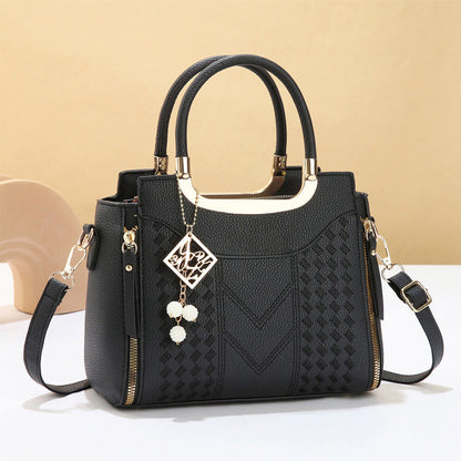 Elegante borsa da donna con manico superiore e tracolla