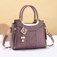 Elegante borsa da donna con manico superiore e tracolla