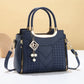 Elegante borsa da donna con manico superiore e tracolla