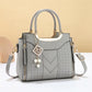 Elegante borsa da donna con manico superiore e tracolla