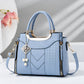Elegante borsa da donna con manico superiore e tracolla