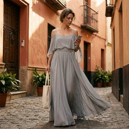 👗 50% RABATT! 💃 Cold shoulder maxiklänning – Elegant & flödande design – Framhäver axlarna, smickrande passform & mjukt fall – perfekt för fest, bröllop eller varma sommarkvällar 🌿✨