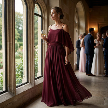 👗 50% RABATT! 💃 Cold shoulder maxiklänning – Elegant & flödande design – Framhäver axlarna, smickrande passform & mjukt fall – perfekt för fest, bröllop eller varma sommarkvällar 🌿✨