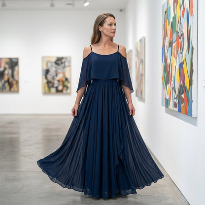 👗 50% RABATT! 💃 Cold shoulder maxiklänning – Elegant & flödande design – Framhäver axlarna, smickrande passform & mjukt fall – perfekt för fest, bröllop eller varma sommarkvällar 🌿✨