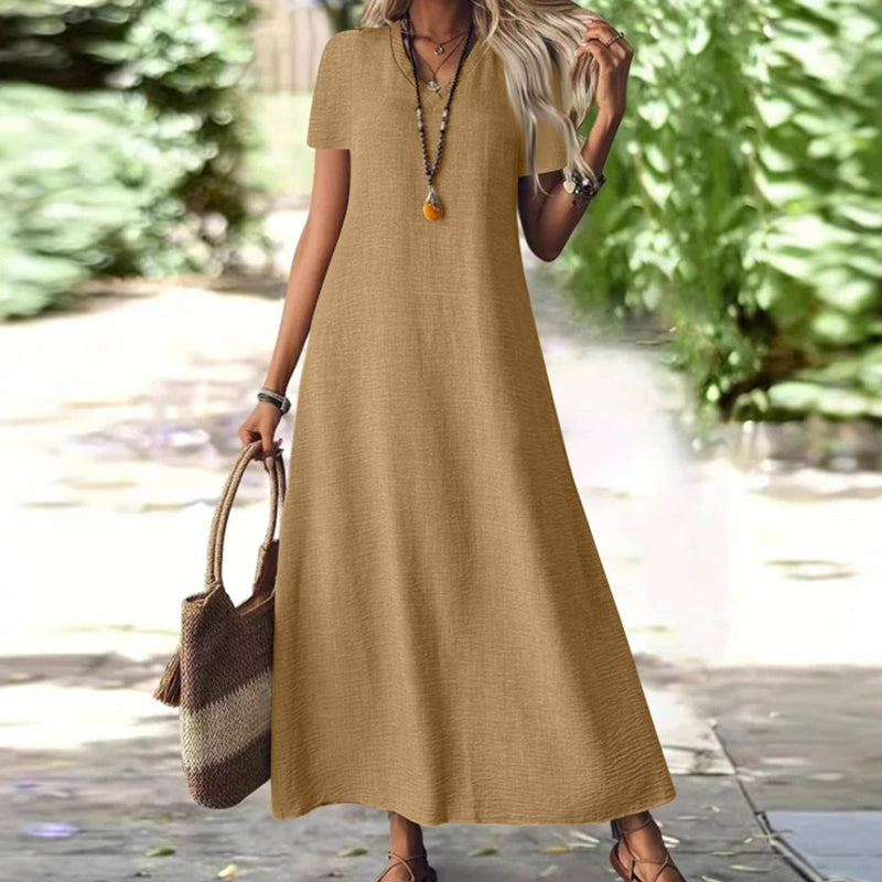 👗🌸 Mångsidig sommarklänning med V-hals och korta ärmar– luftig, smickrande & perfekt för alla dagar