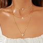 Collier multicouche élégant avec pendentif délicat