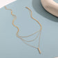 Collier multicouche élégant avec pendentif délicat
