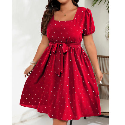 Abito a pois da donna taglie forti