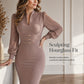Abito aderente da donna elegante con scollo a V e maniche a vescica