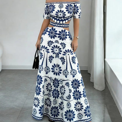 Abito da resort da donna con spalle scoperte, vita con cut-out e stampa di margherite